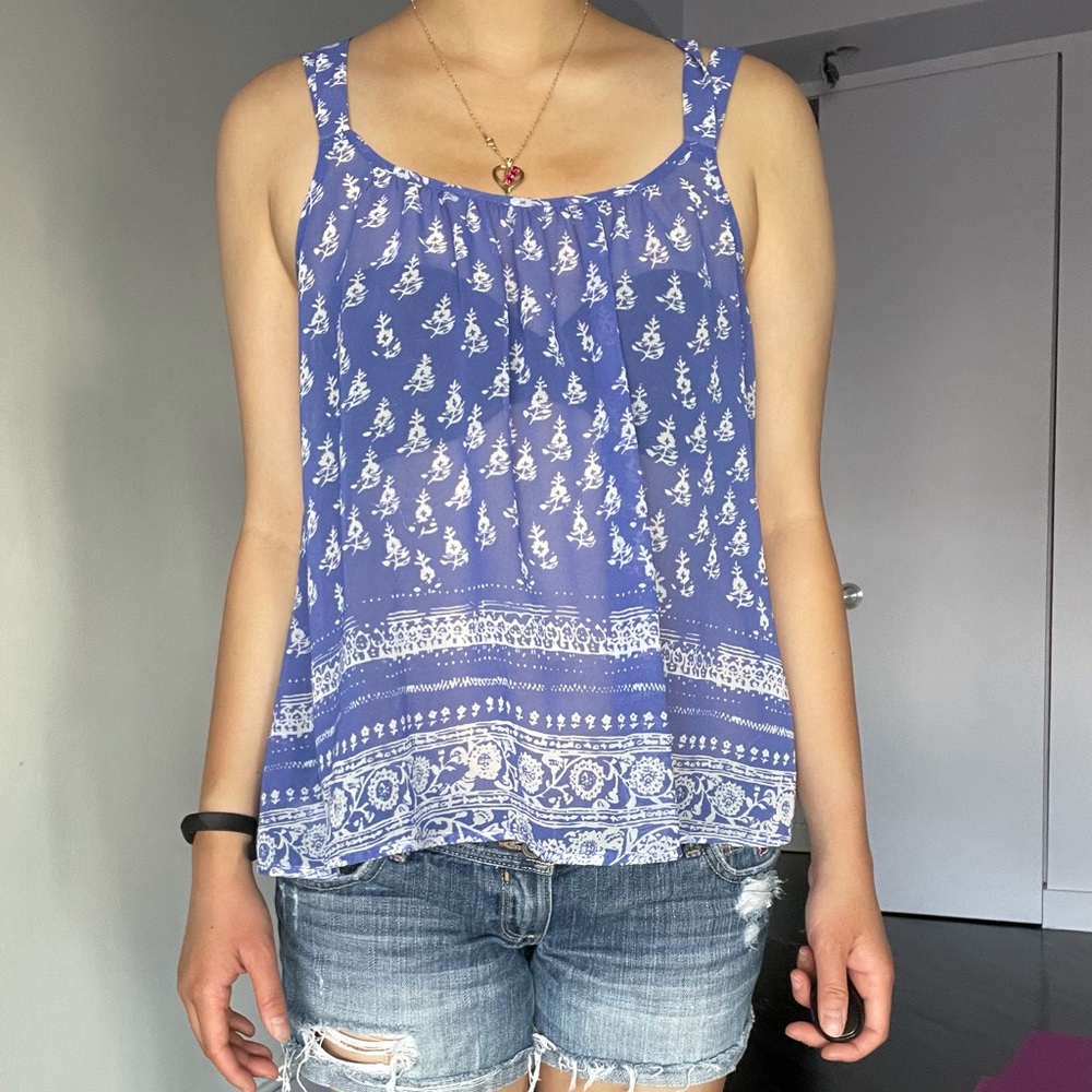 Flowy purple patterned tank top with cross back